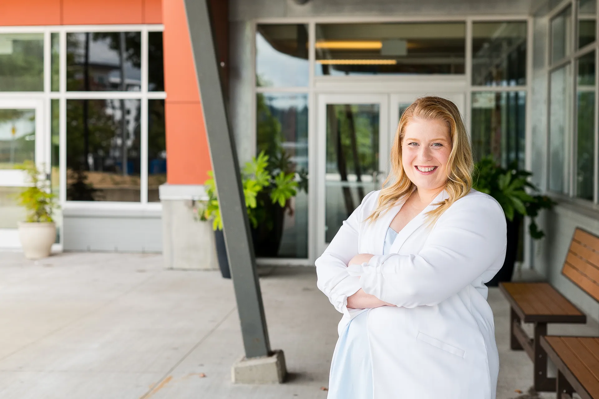 Jessica Morrison standing outside a Port Moody school building.